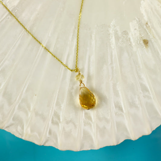 Gold citrine gemstone necklace.