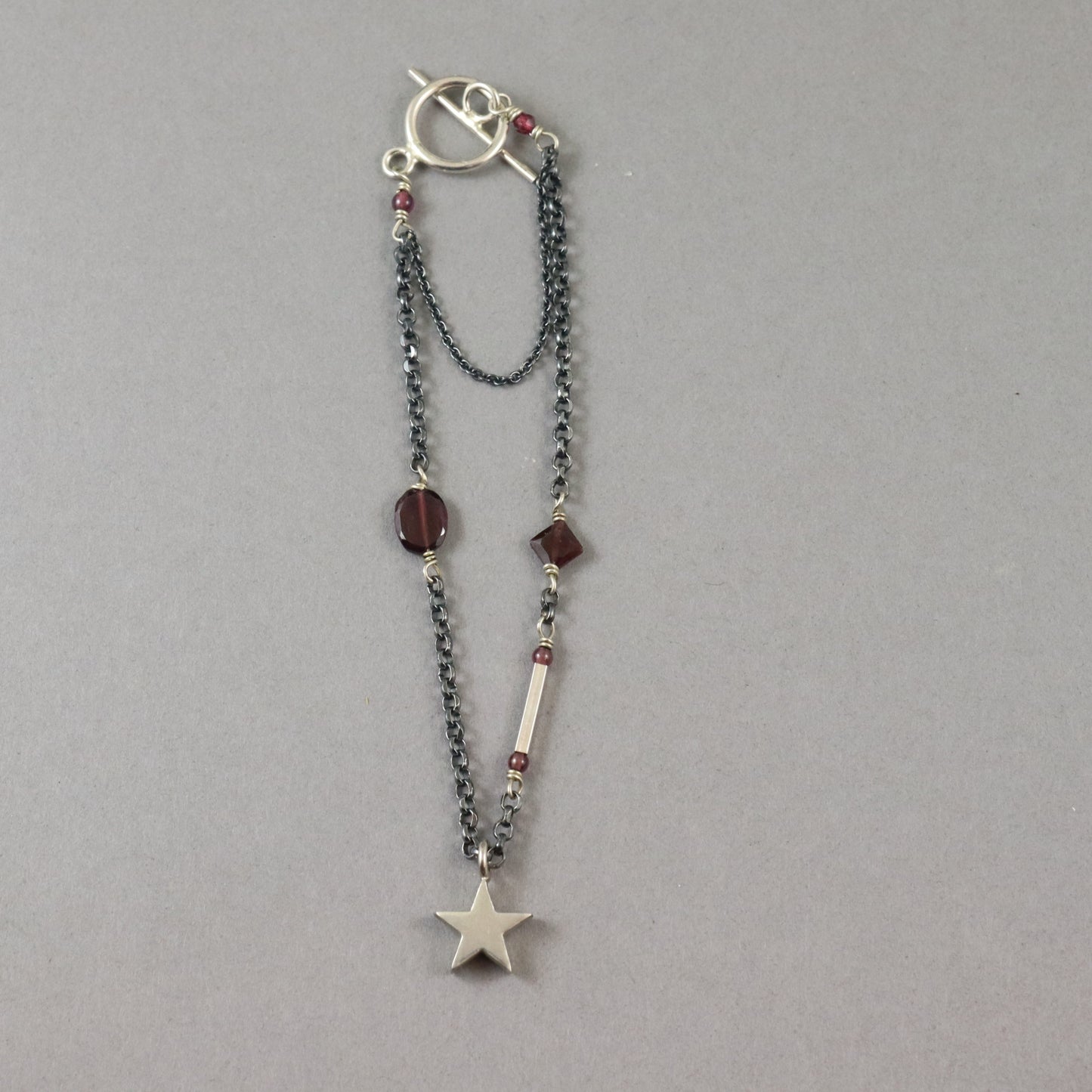 Garnet Oxidised Silver Star Bracelet