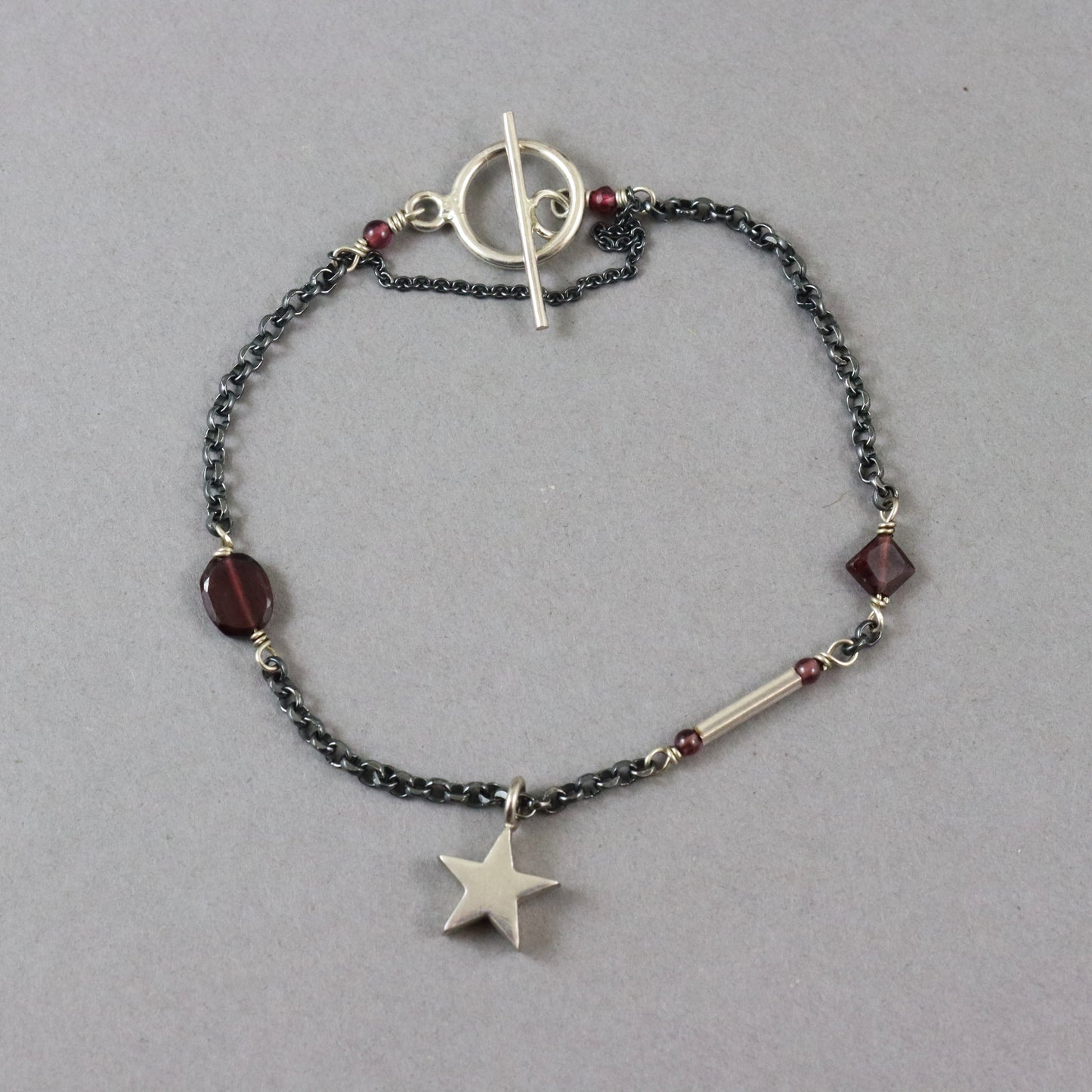 Garnet Oxidised Silver Star Bracelet