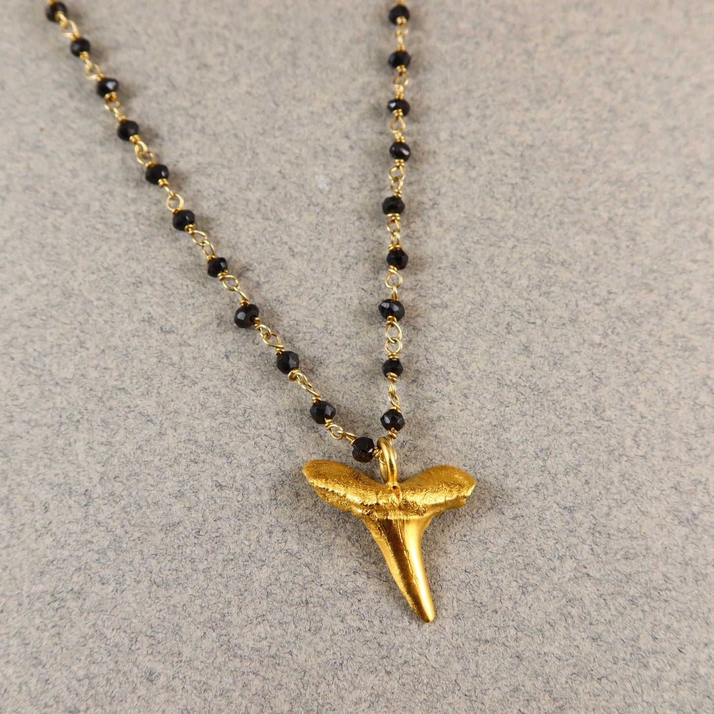 Gold Sharks Tooth & Onyx Gems