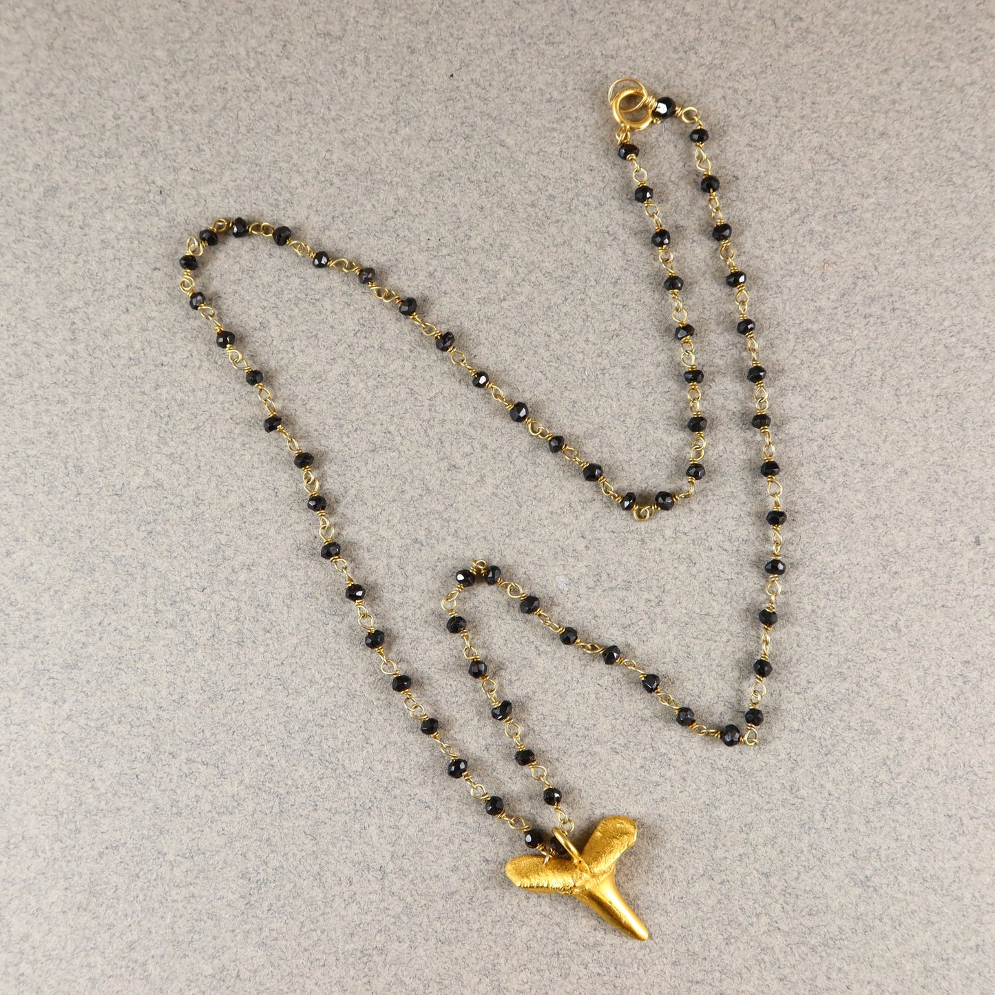 Gold Sharks Tooth & Onyx Gems